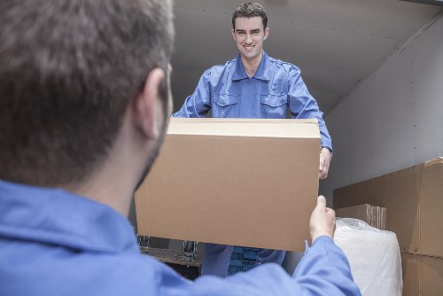 Family preparing for a home move with a removal van