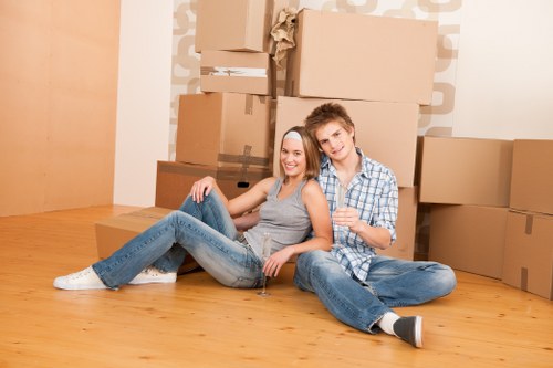 Movers loading furniture into a Van