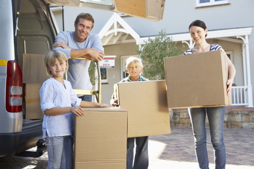 Professional movers loading a removal van